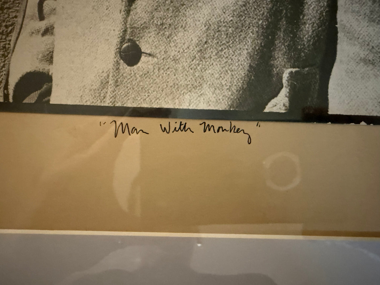 Man with Monkey Photograph by Julia Nead, signed and dated 1976